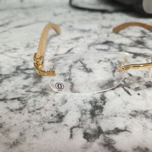Cartier Gold Rimless Glasses